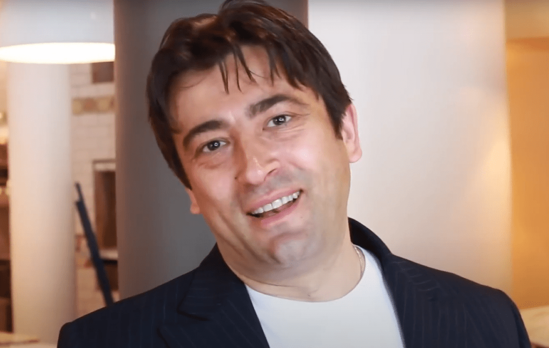 a man smiling for the camera