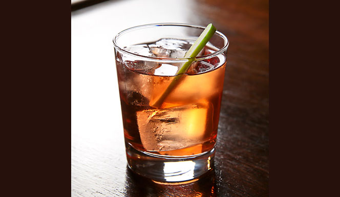 recipe-maple-leaf-sazerac-from-minetta_9.html a glass of orange juice