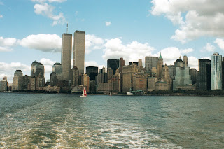 wtc a large body of water with a city in the background