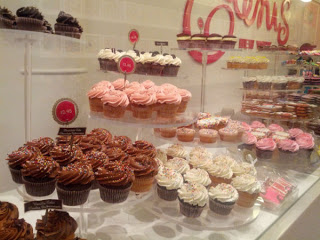 a display in a store filled with lots of food