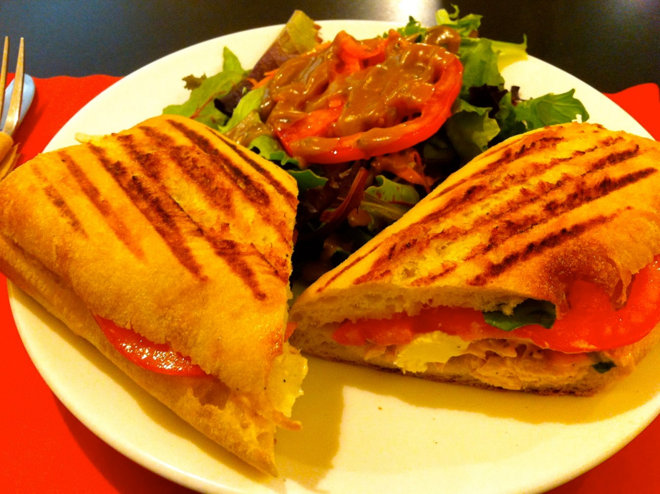 a sandwich cut in half on a plate