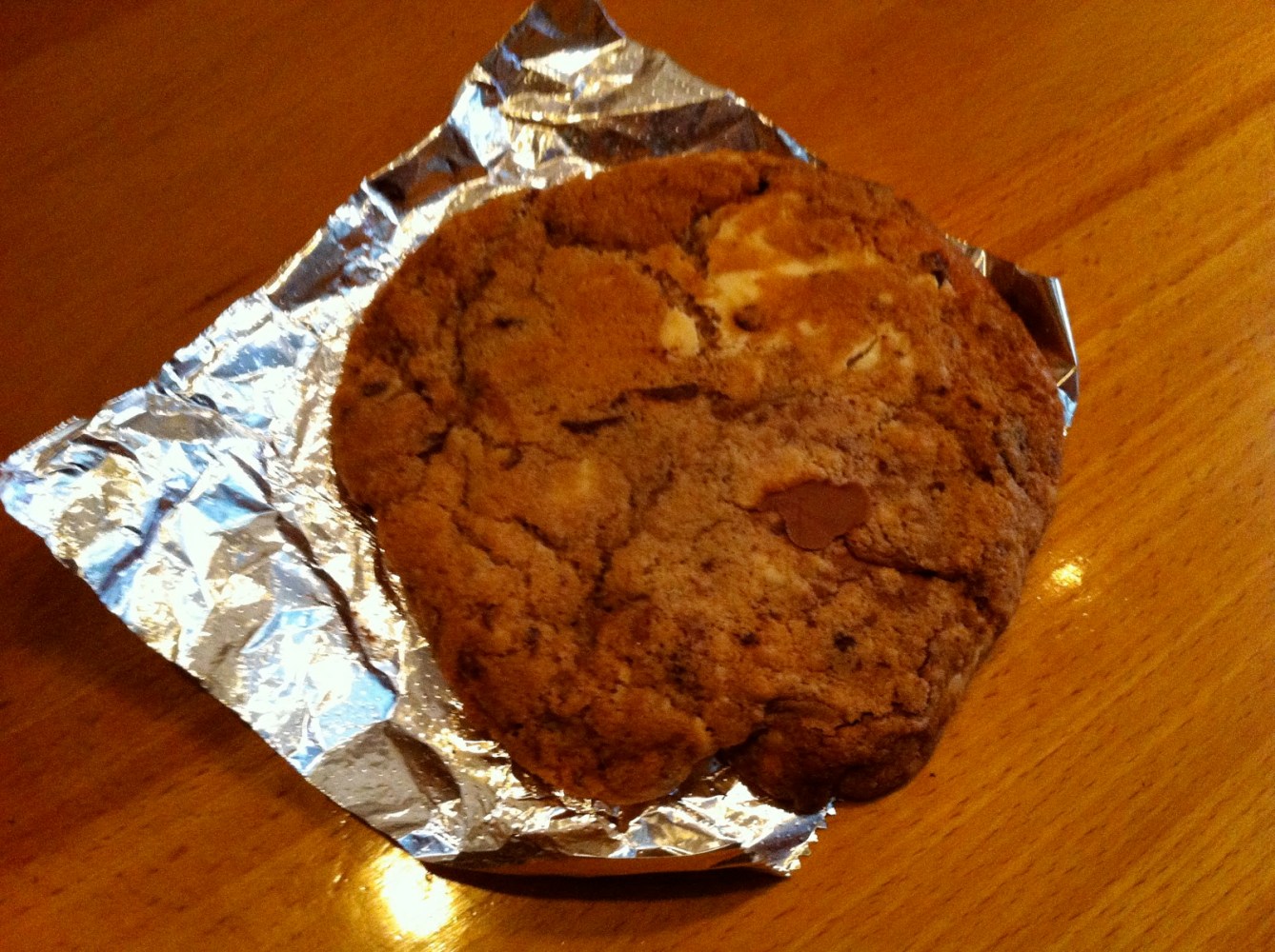 a piece of cake sitting on top of a wooden table