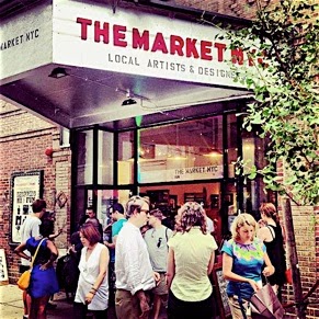 a group of people walking in front of a store