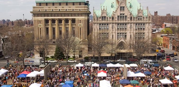a group of people in a large city