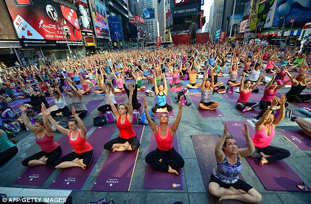 a group of people sitting in front of a crowd