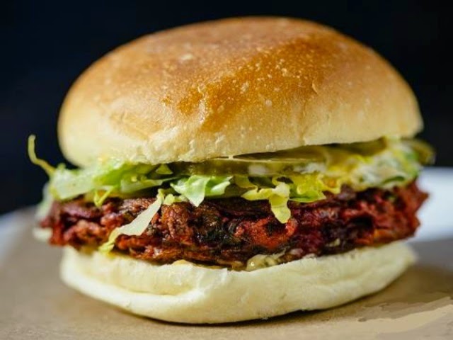 a close up of a sandwich sitting on top of a table
