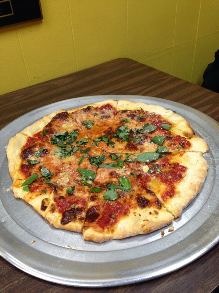 a pizza sitting on top of a table