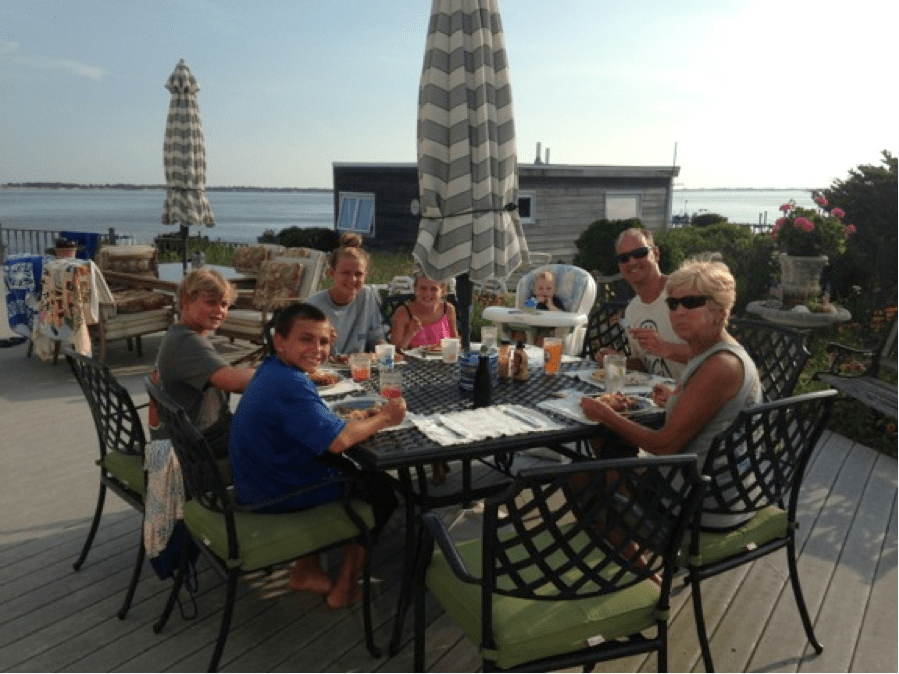 a group of people sitting at a table