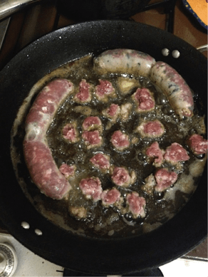 a pizza sitting on top of a pan on a stove