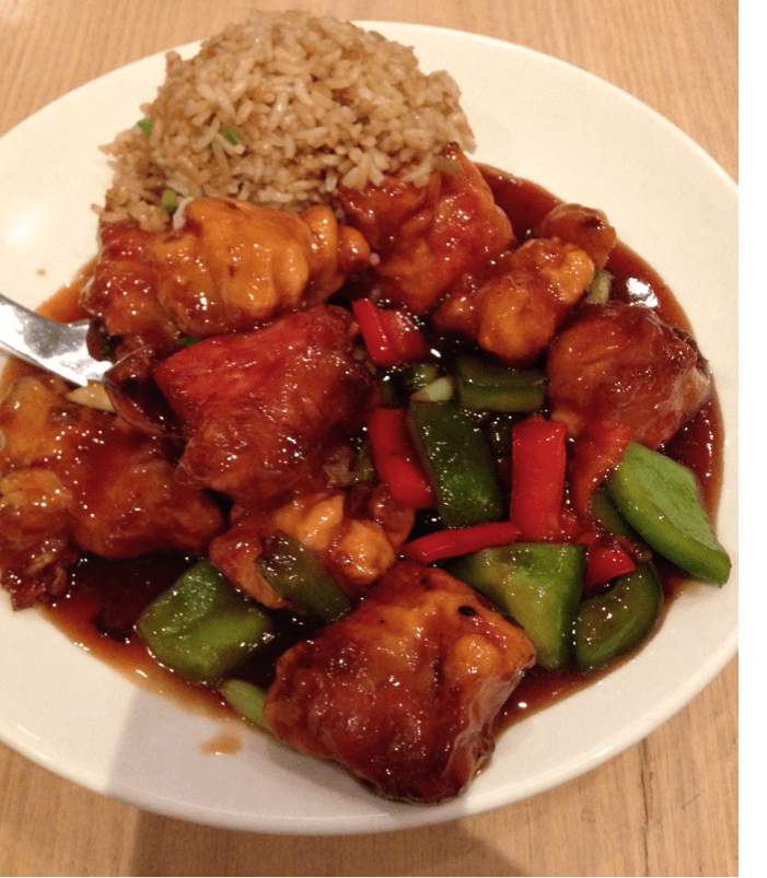 a plate of food with meat and vegetables