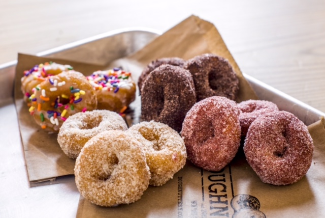 Doughnuttery a group of assorted doughnuts on a table