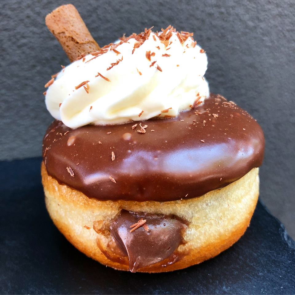 a close up of a doughnut sitting on a table