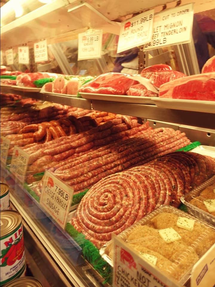 a bunch of food is on display in a store
