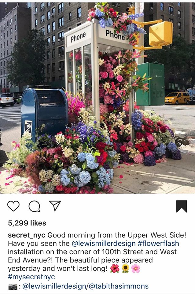 a sign on the side of a flower