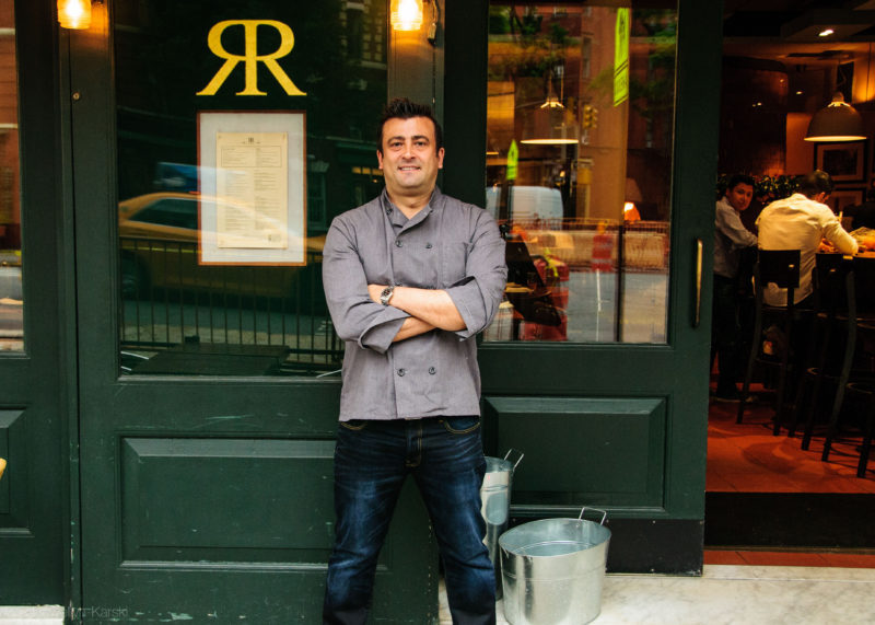 a person standing in front of a store