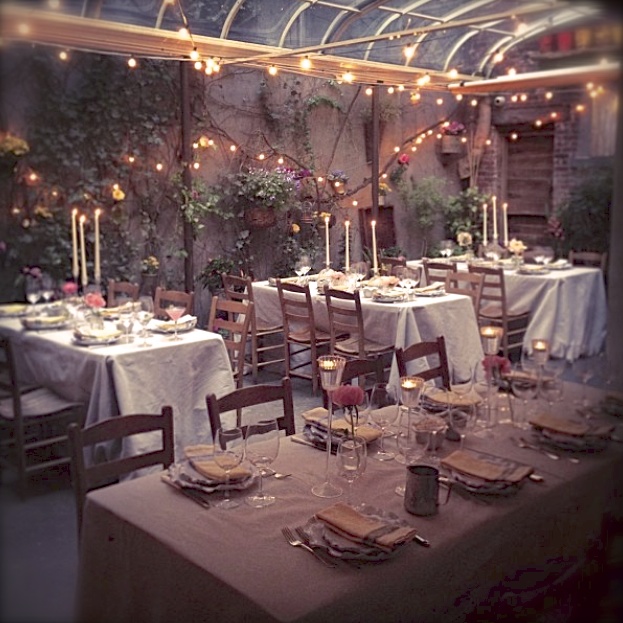 a dining room table in front of a building