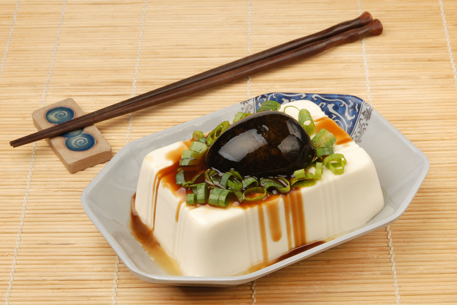 the-weirdest-food-you-can-find-in-new-york-city-img a plate of food sitting on top of a wooden table