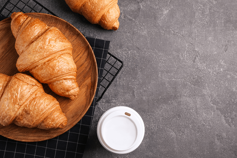 x-best-croissants-in-nyc-to-satisfy-your-craving food on a table