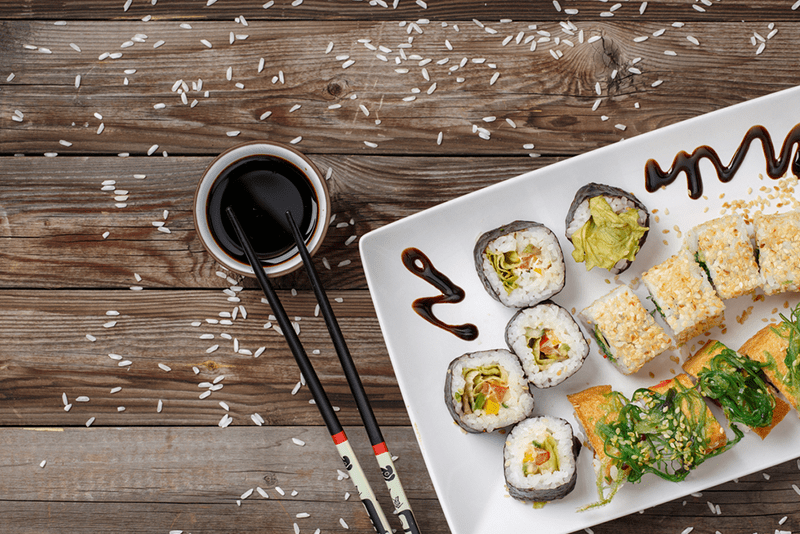 x-sushi-spots-youll-love-in-greenwich-village a bunch of food sitting on a table
