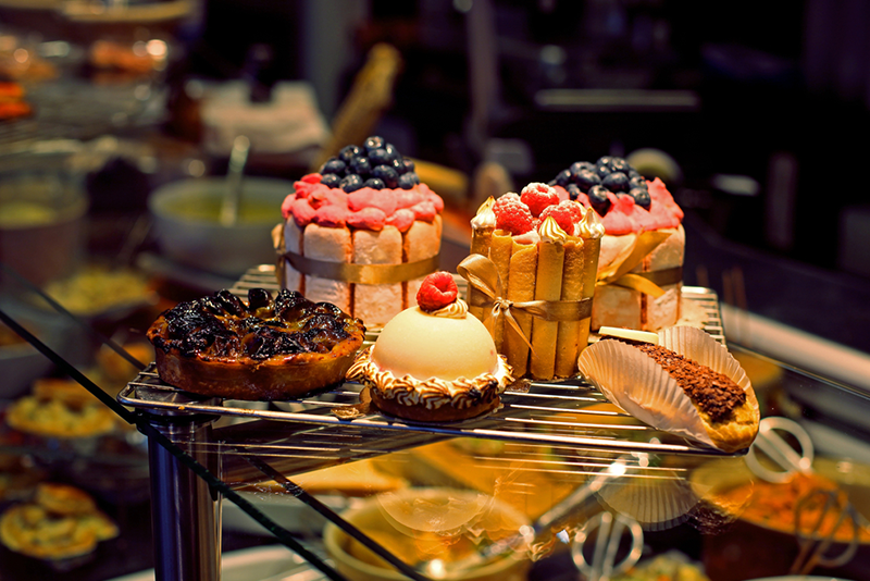 nycs-sweetest-escape-a-dessert-tour-you-cant a cake sitting on top of a table