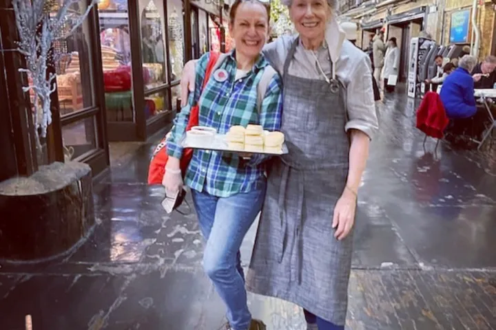 a person walking down a sidewalk