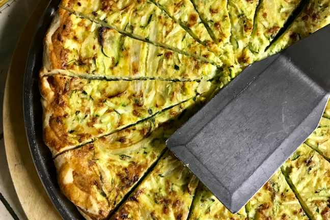 a slice of pizza on a grill