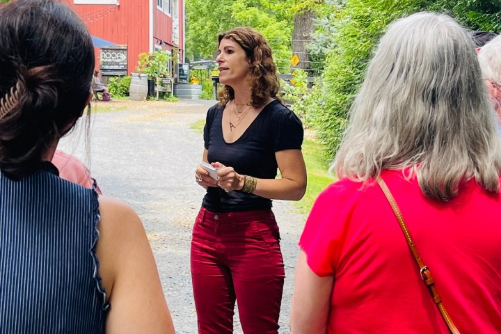 Sonia Kälin et al. standing next to a person