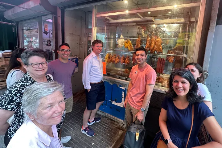 a group of people posing for the camera