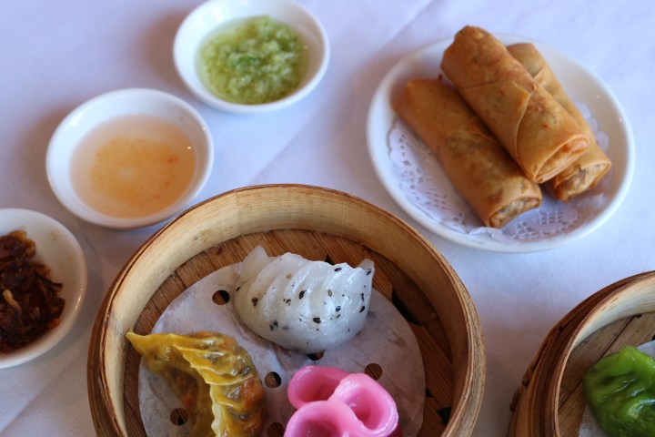 a bowl filled with different types of food on a plate