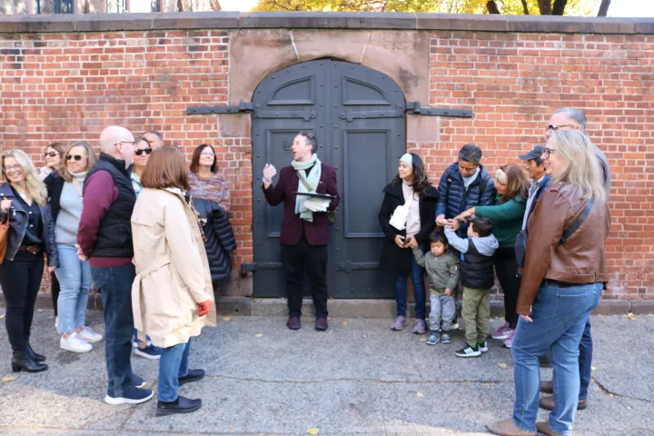 a group of people standing in front of a building