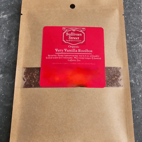 Brown kraft paper tea package with a red label reading 'Very Vanilla Rooibos'.