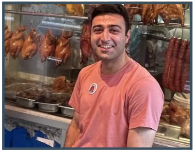 a man standing in front of a store