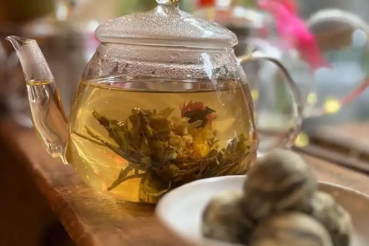 a glass of beer on a table