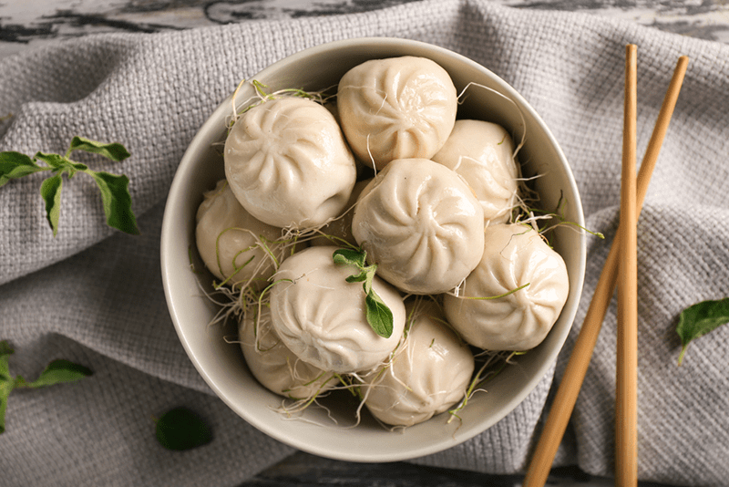 the-6-dumplings-you-absolutely-need-to-taste a bowl of fruit sitting on a table