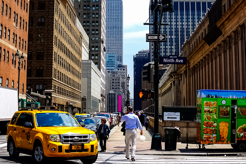how-to-make-the-most-of-new-york-weekend-tours a car driving down a busy city street