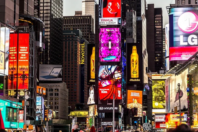 new-york-itinerary-best-ways-to-tour-nyc a close up of a busy city street